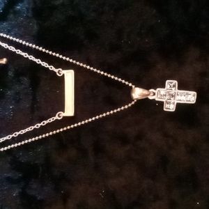 2 necklaces 2 bandits necklaces one is man made opal bar the other blue crystal